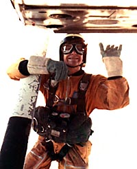 John exiting a Cessna.